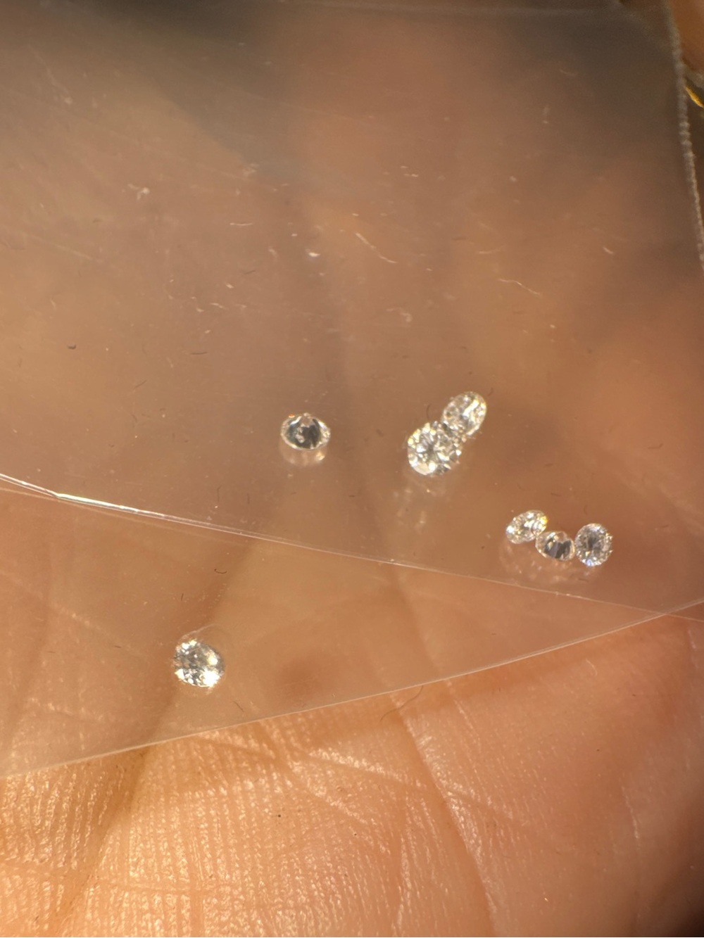 6 loose real diamonds removed from ring